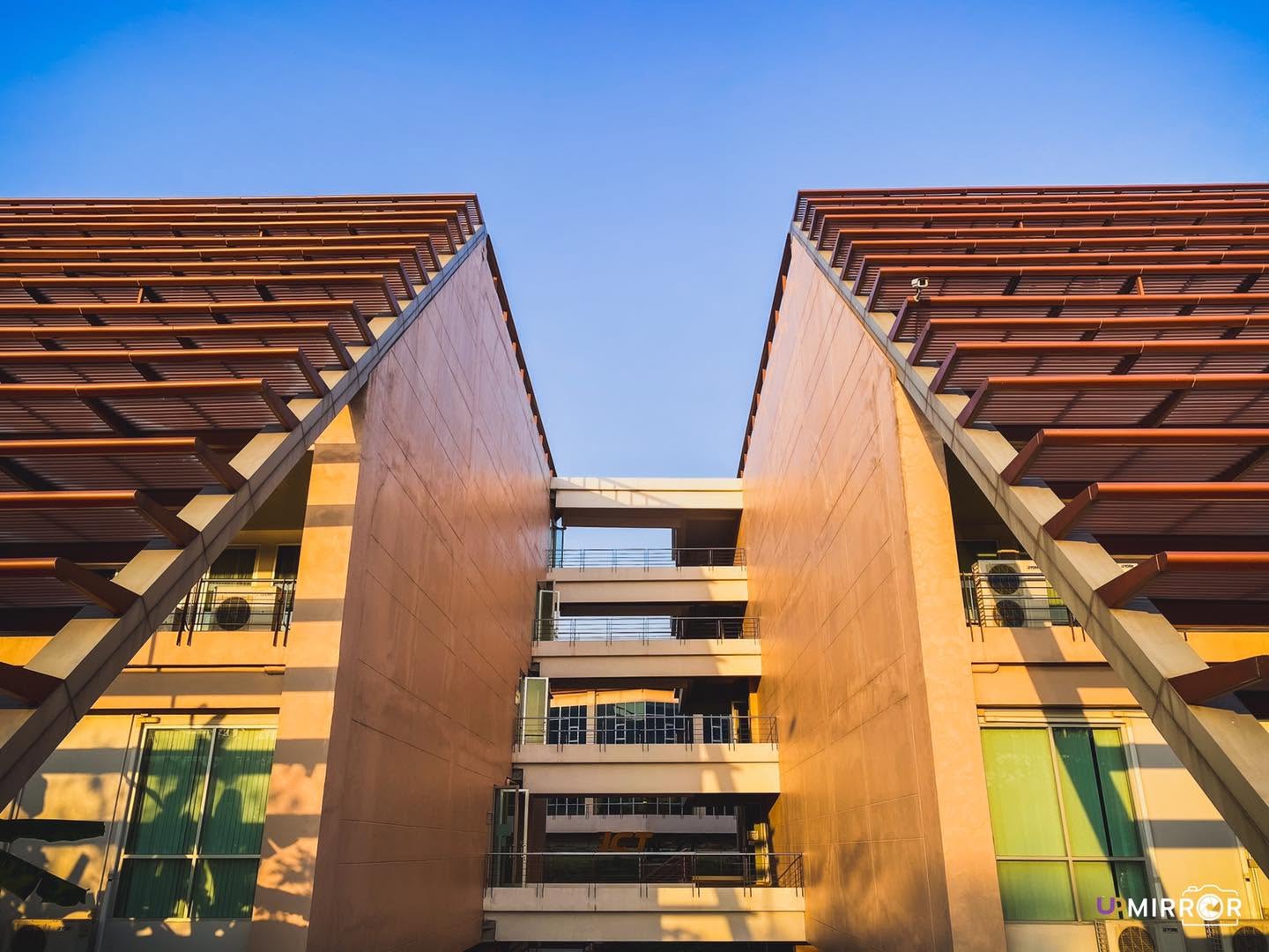 Building with wood shading facade