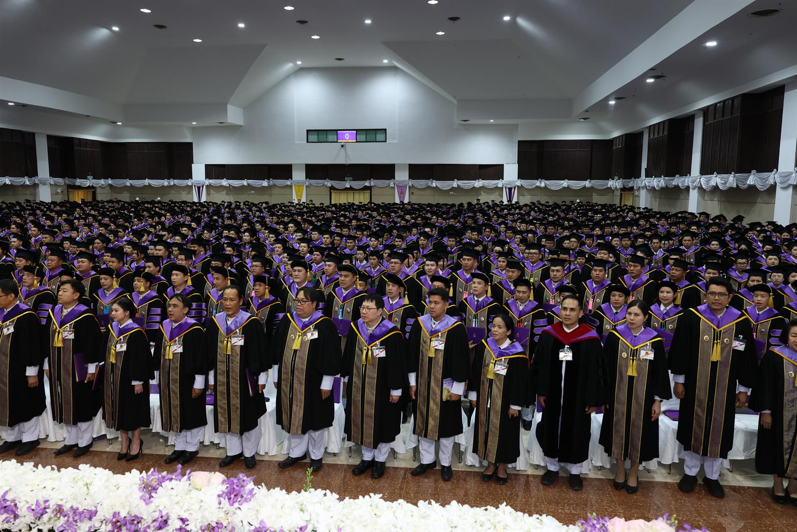 Wide view of the University of Phayao graduation ceremony hall filled with graduates