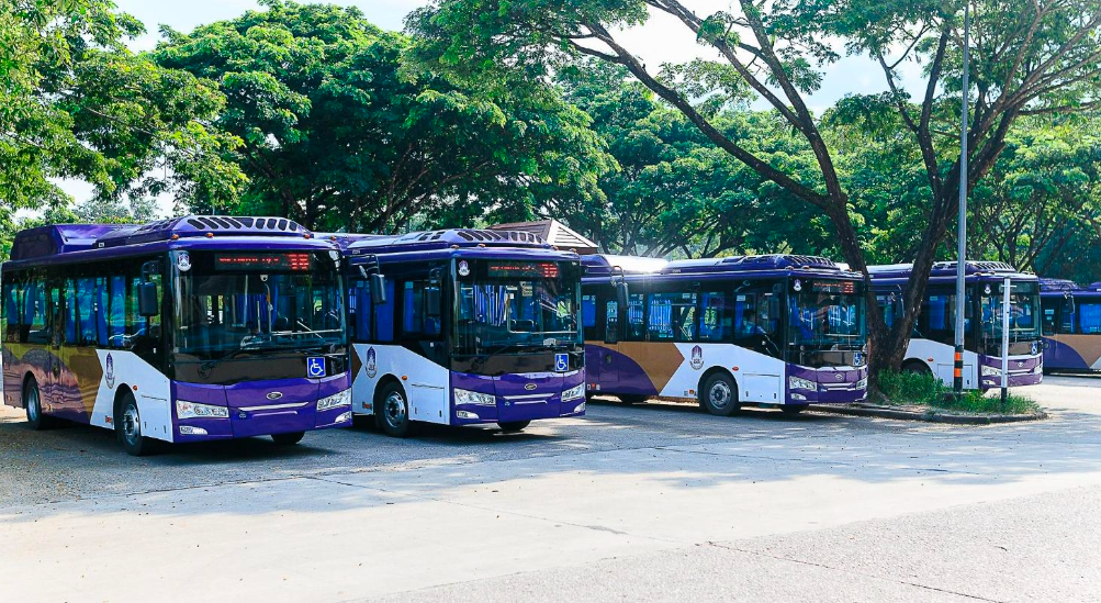 EV buses parked on campus