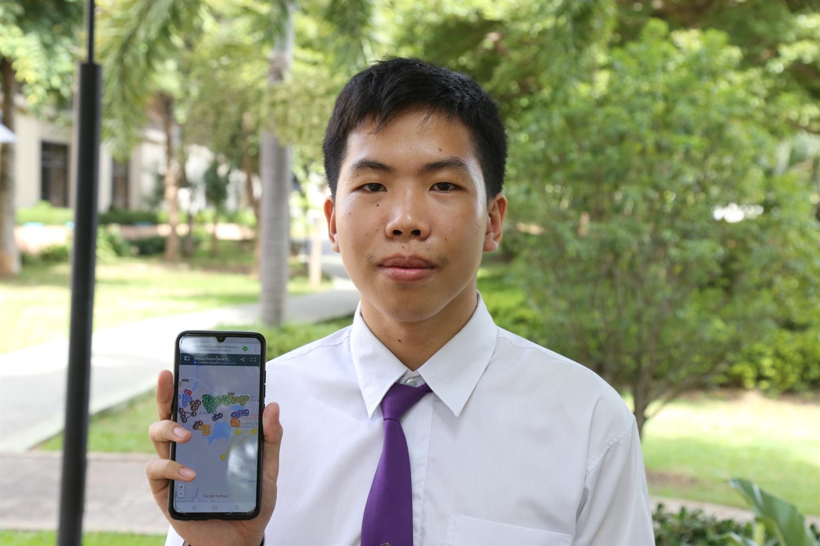 Student using waste disposal map application, University of Phayao
