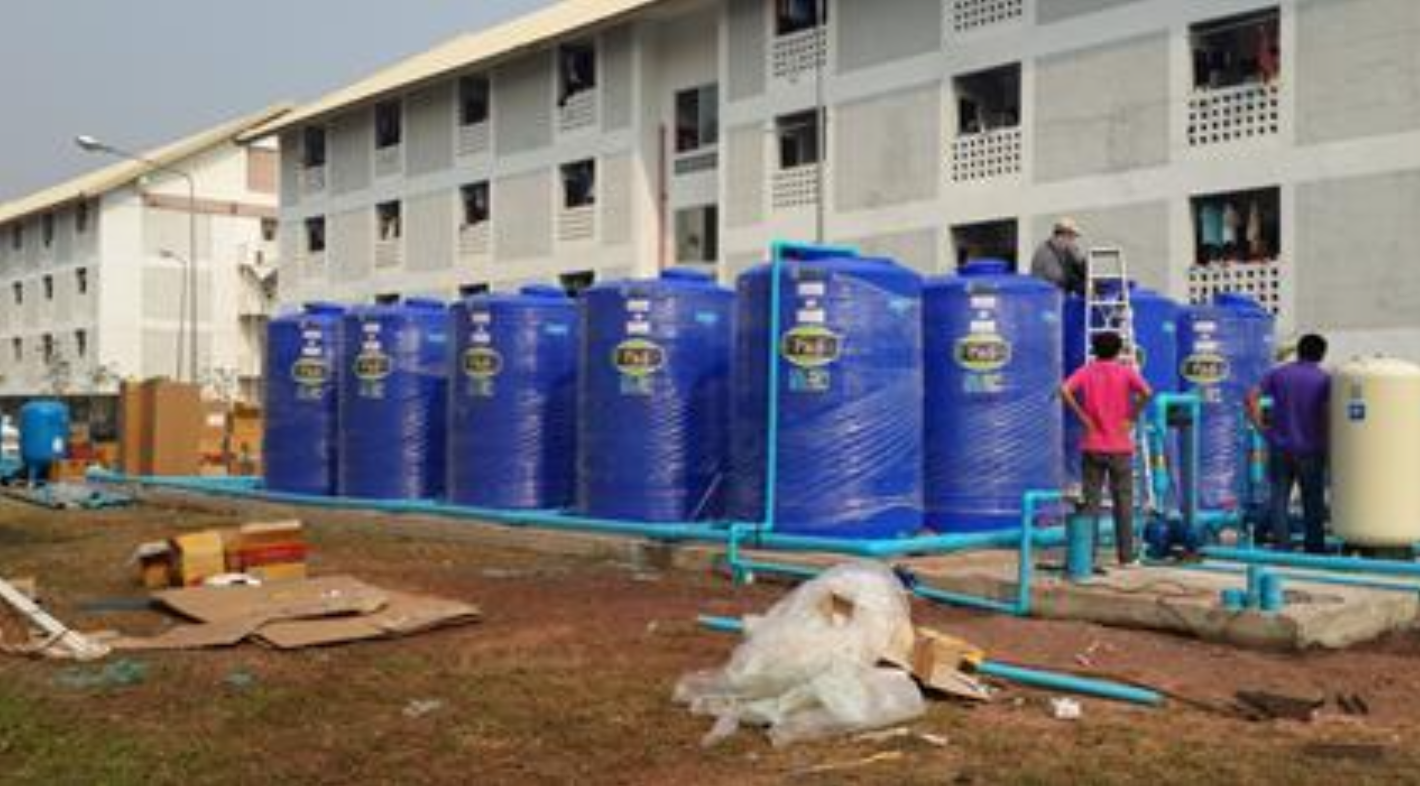Rainwater collection storage tanks installed on campus