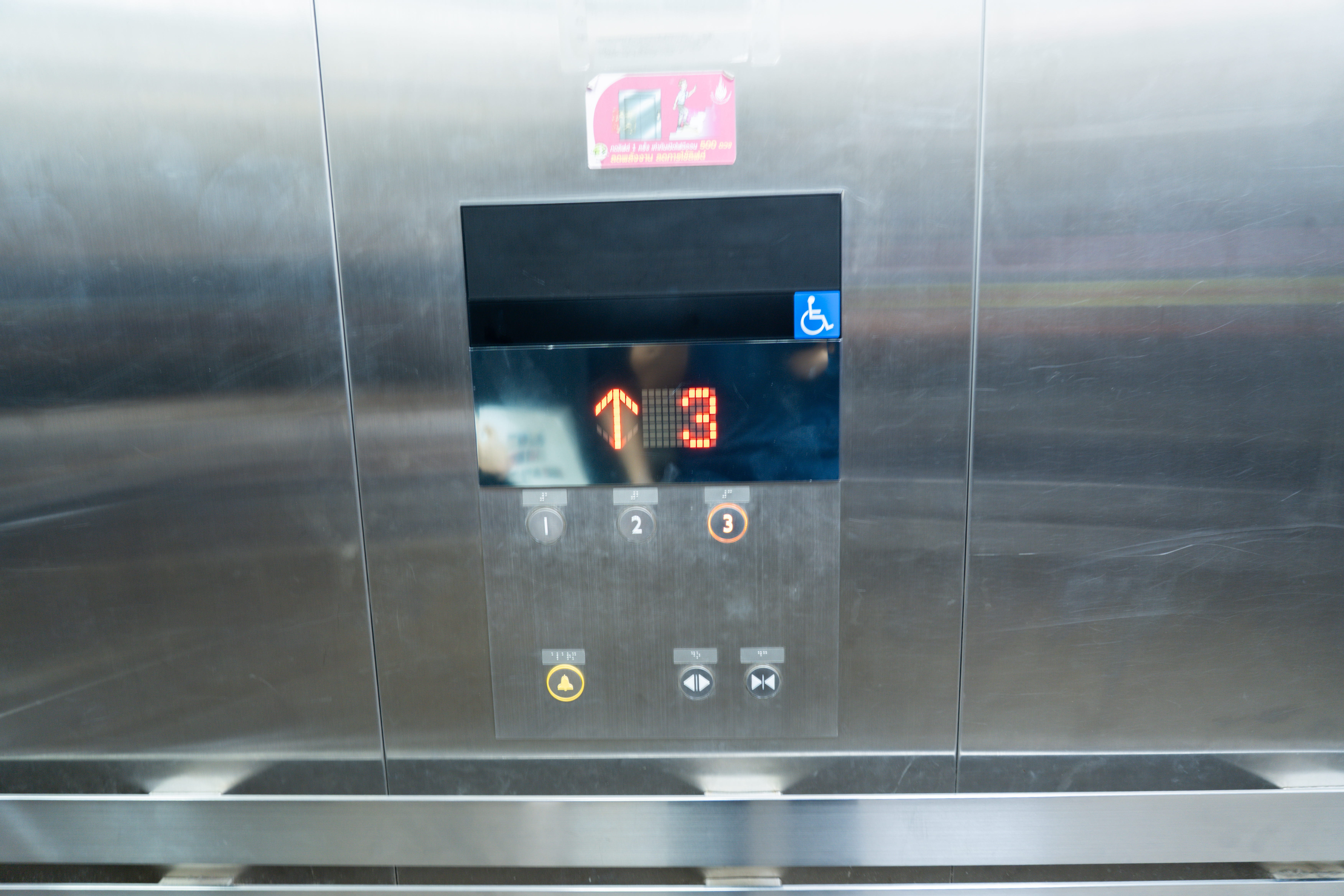 Elevator with braille signs at University of Phayao