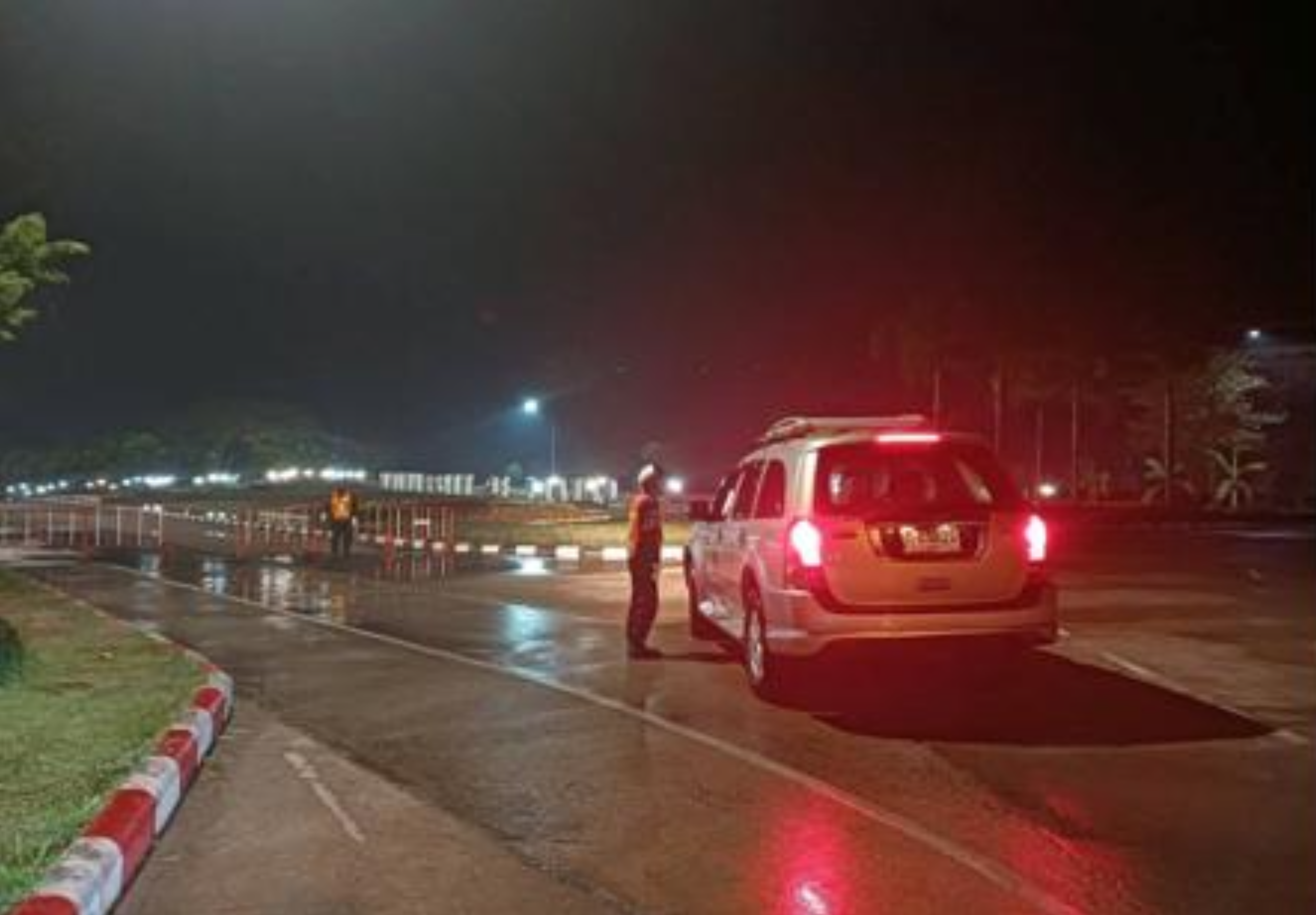 Security officer directing traffic