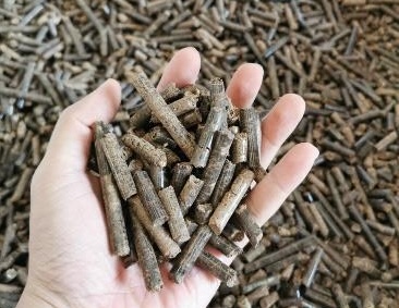 Close-up of agricultural residue pellets used for sound-reducing panel production
