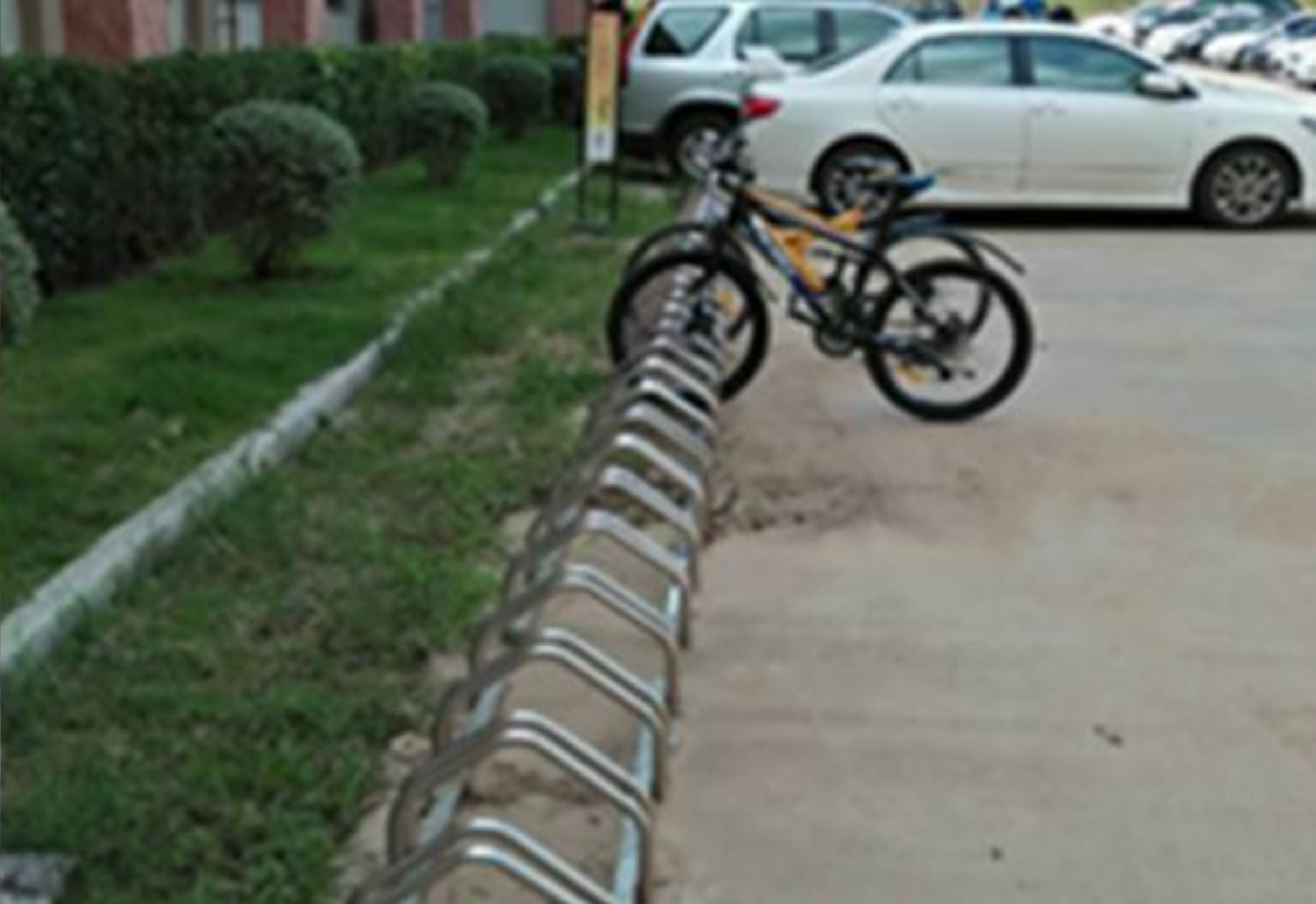 Bicycle rack on campus pathway